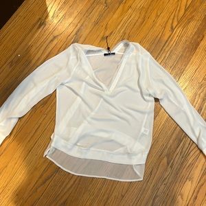 Beautiful new (tags missing, but hangers still attached) Ro & De cream work top.